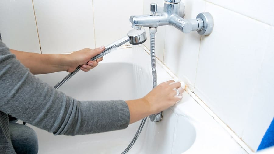 repairing a leaky bath faucet